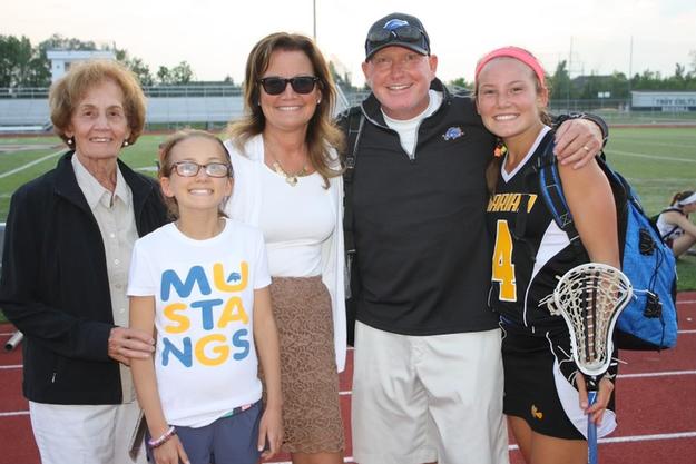 Grombala (far right) with her family after a Marian lacrosse game.