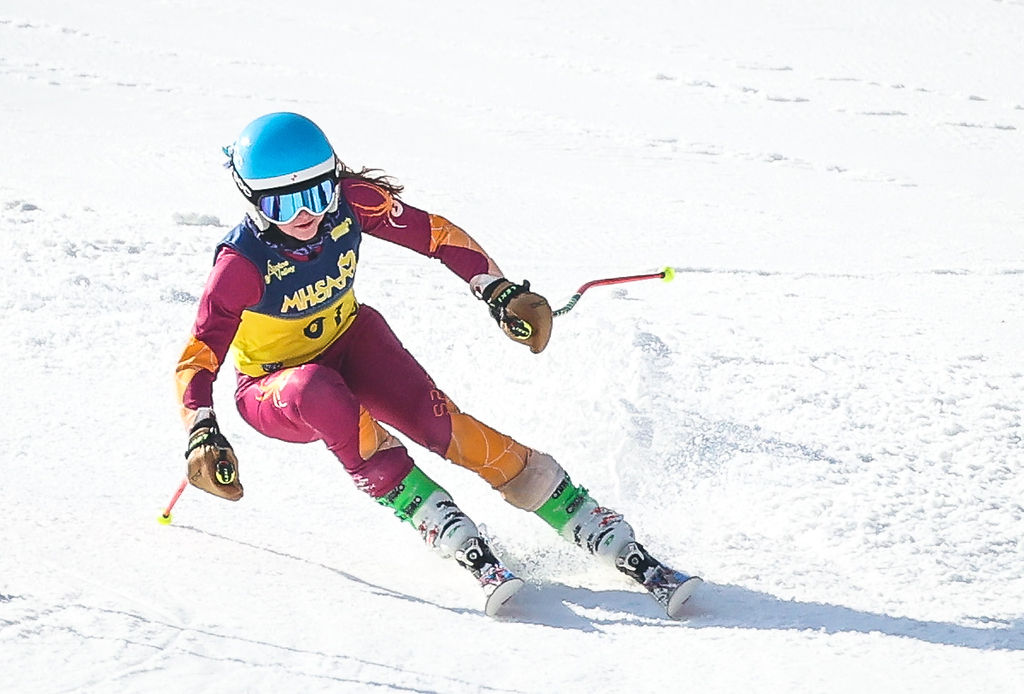 Susie Klein navigates the course, finishing 6th in giant slalom and 4th in slalom.